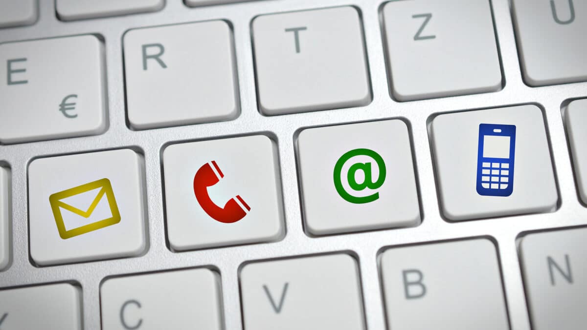 Contact us symbols on computer keyboard