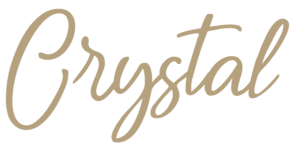 Elegant script font spelling 'Crystal' in tan colour